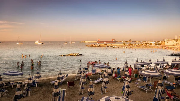 Sunset on the seafront at Otranto in southern Italy. — Stock Photo, Image