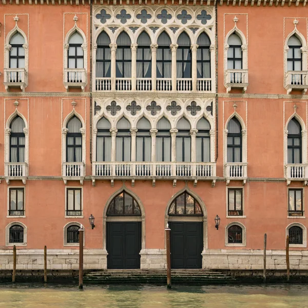 Historic buildings on the banks of the grand canal in Venice.