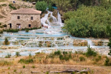 Natural spa with waterfalls in Saturnia, Italy. clipart