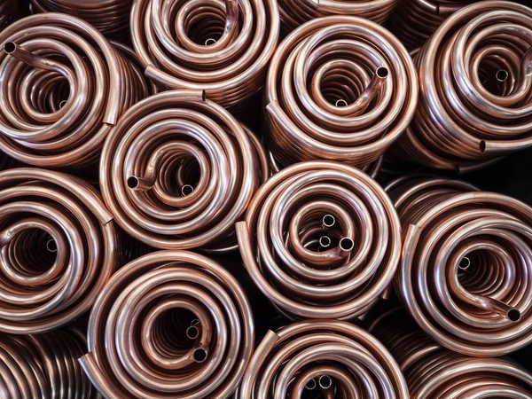 Heat exchangers obtained by wrapping copper tube. — Stock Photo, Image