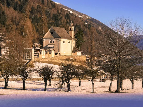 Winter view of the village of Ossana, Val di Sole, Trentino-Alto Adige, Italy.