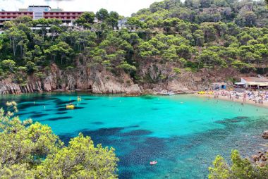 Crystal waters close to the beautiful beach of Aiguablava in Begur village, Mediterranean sea, Catalonia, Spain. clipart