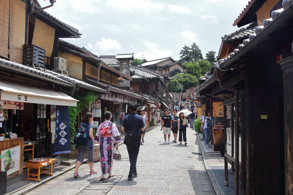 Kyoto, Japan-August, 11th of 2017:Tourists in the stone-paved roads Ninenzaka and Sannenzaka that lead up to the World Heritage Kiyomizu Temple, which was founded in 778 during the early Heian period.