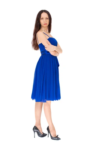 白い背景の上ジャンプ青いドレスの魅力的な女の子 — ストック写真