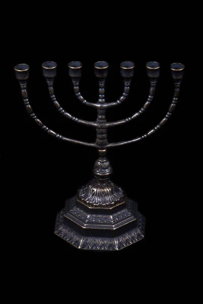 Antika rituella candle menorah på svart bakgrund — Stockfoto