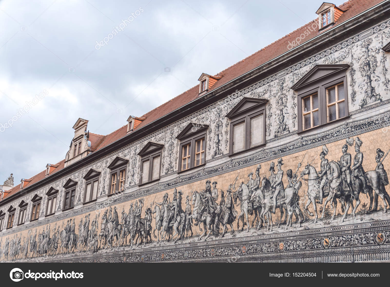 Old Gothic building in Dresden. A painted mosaic of the facade of the