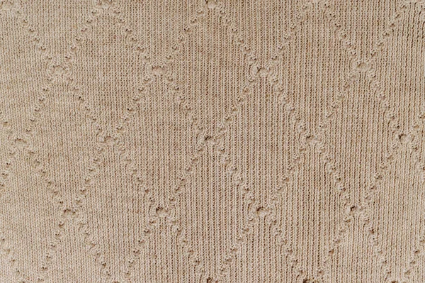 Beige knitted linen fabric with geometric pattern