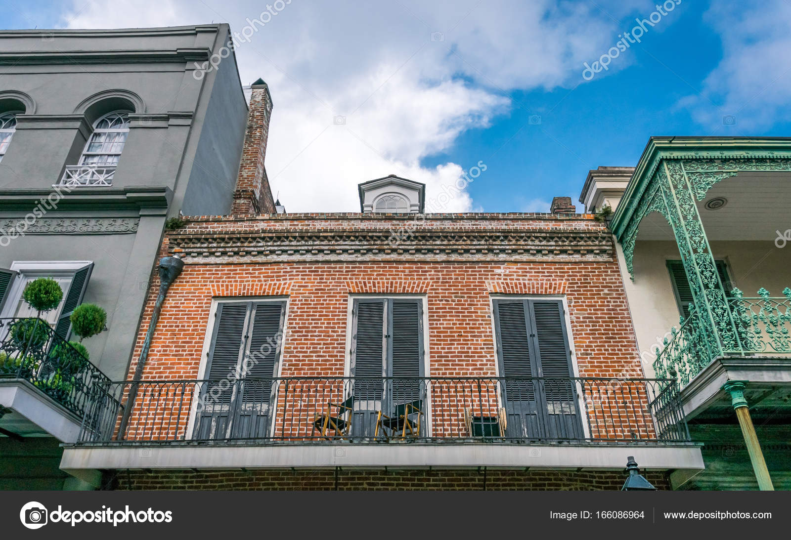 Ancient residential mansions on Bourbon Street. French Quarter, New Orleans, Louisiana, USA