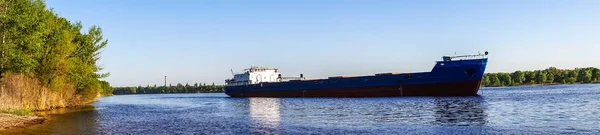 Cargo river barge. Cargo transportation by water transport