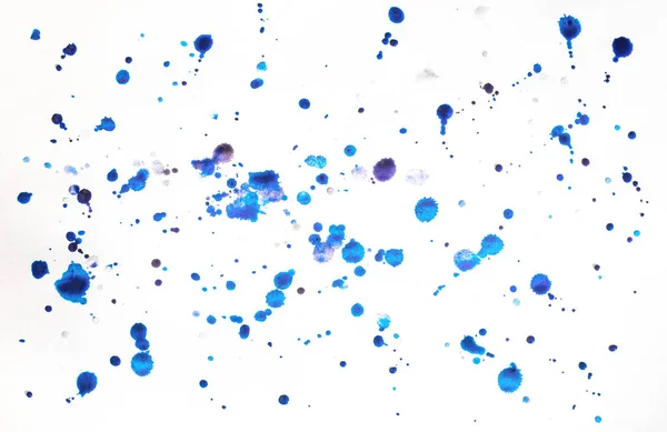 Multi-colored splashes of watercolor paints on white paper. Abstract winter background