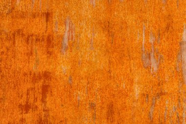 Eski metal yüzeyde paslı kırmızı lekeler