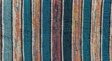 Motley pürüzlü dokuma altlığı. Boho şık tarzı