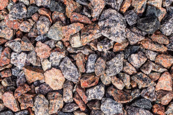 Background and texture of gravel, crushed granite stone