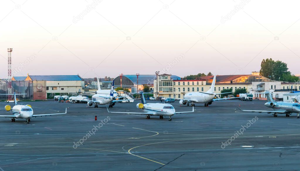 Kiev / Ukraine - June 12 2017: Embraer passenger airliner on the runway of Kiev International Airport in Kiev city, Ukraine. International Airlines in Europe. Transportation of goods and passengers