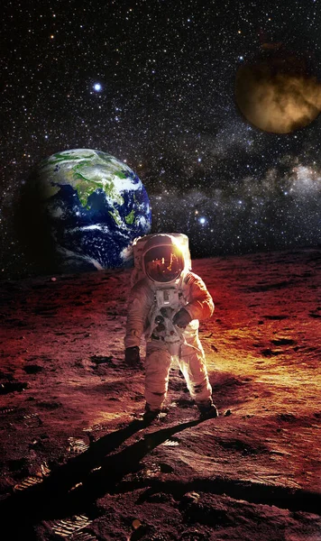 Astronaut on the Mars with an Earth and Yellow Moon in background - Elements of this Image furnished by NASA — Stock Photo, Image