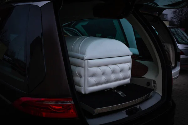 Funeral home with new modern like a Sofa chester coffin style in car — Stock Photo, Image
