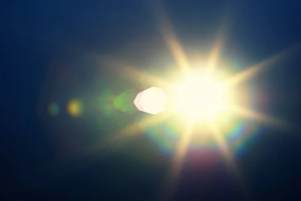 Diagonal blue glowing sun flare background — Stock Photo, Image