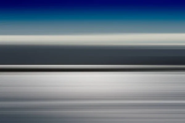 Horizontal motion blur blue ocean landscape background — Stock Photo, Image
