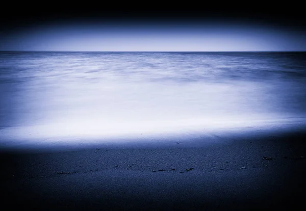 Tidal waves long exposure vignette background
