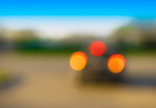 Горизонтальні автомобільні задні ліхтарі фону боке — стокове фото