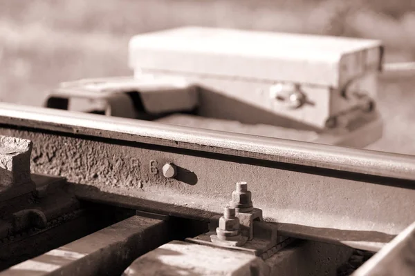 Toolkit de manutenção ferroviária sepia bokeh fundo — Fotografia de Stock