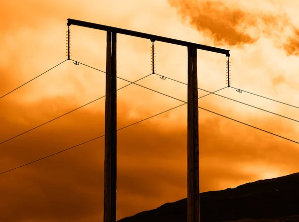 在挪威背景日落电力线 — 图库照片