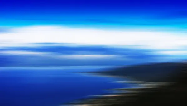 Horisontell rörelse oskärpa strand landskap bakgrund — Stockfoto