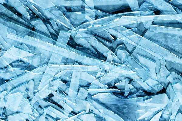 Fragments de verre bleu fond texturé — Photo