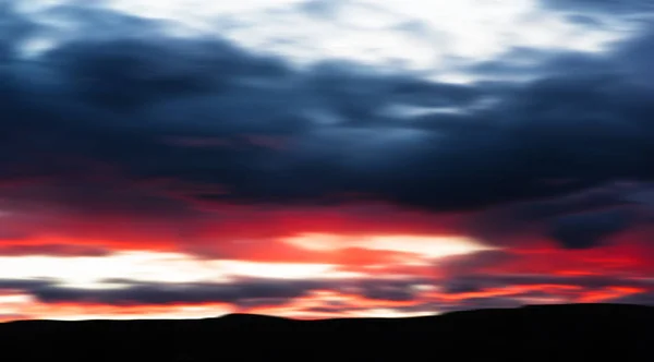 Nuages rouge foncé fond bokeh — Photo