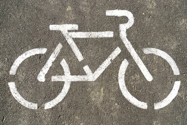 Bisiklet sembolü dokulu asfalt zemin üzerine