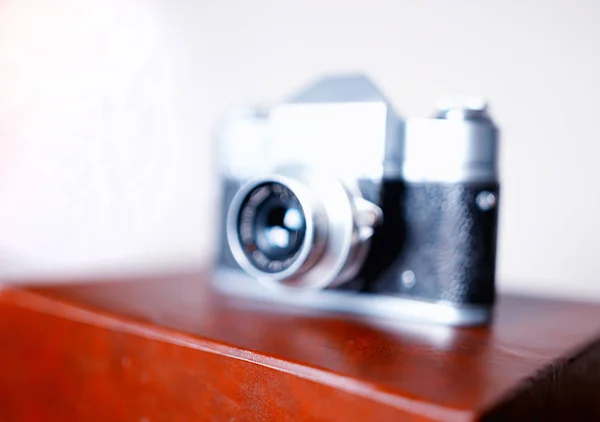 Vintage rangefinder camera bokeh background — Stock Photo, Image