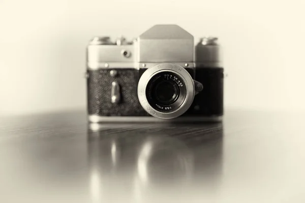 Vintage camera bokeh background — Stock Photo, Image