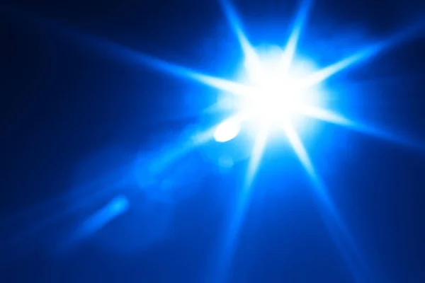 Diagonal blue glowing sun flare background — Stock Photo, Image