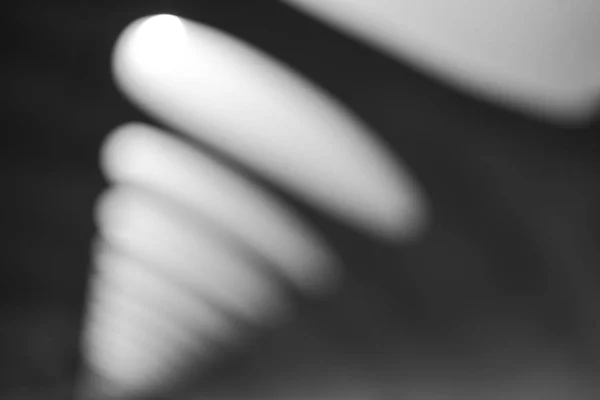 Diagonal black and white lights bokeh background — Stock Photo, Image