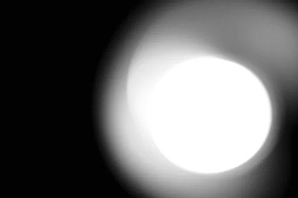 Preto e branco sol disco bokeh fundo — Fotografia de Stock