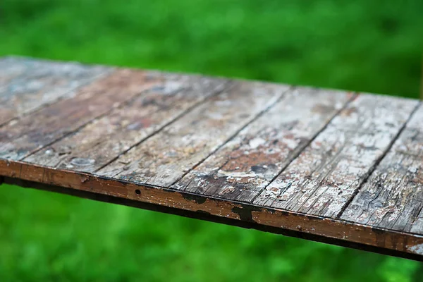 Diagonal vintage wooden table bokeh background — Stock Photo, Image
