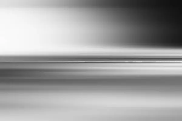 Horizontal black and white motion blur background — Stock Photo, Image