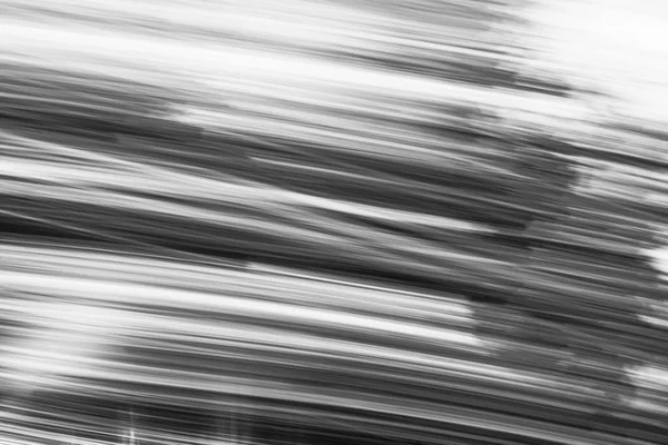 Horizontale schwarz-weiße Bewegungsunschärfe Hintergrund — Stockfoto