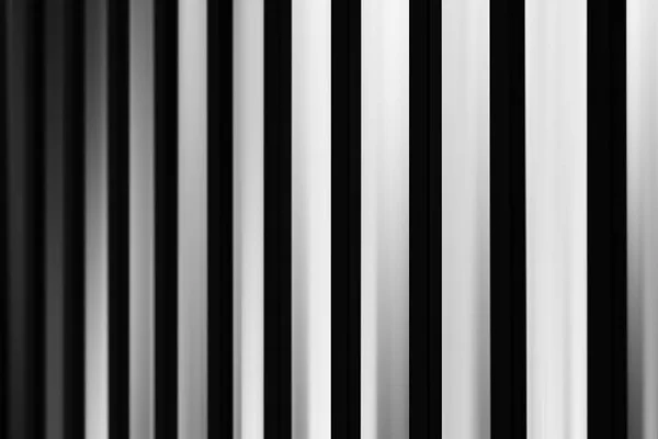Vertical black and white motion blur background — Stock Photo, Image