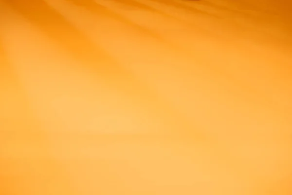 Diagonal orange tomt papper textur bakgrund — Stockfoto