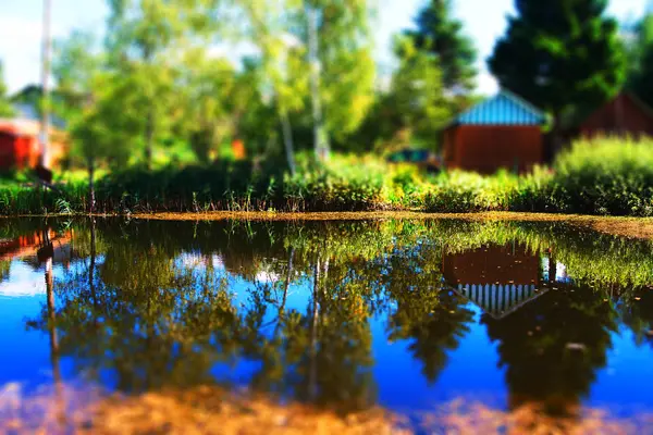Counrtyside lake with dramatic reflections background — Stock Photo, Image