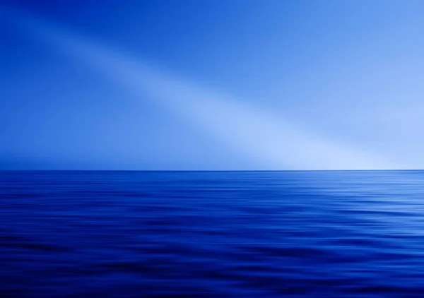 Mavi okyanus ufuk ray ışık soyutlama — Stok fotoğraf