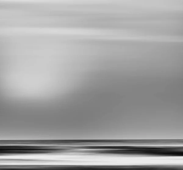 Blanco y negro simple movimiento borroso fondo océano telón de fondo — Foto de Stock