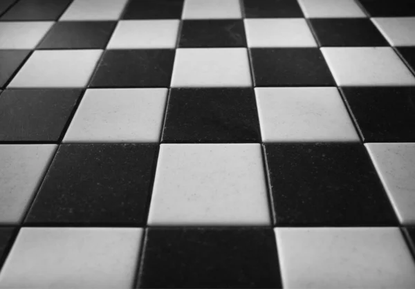 Empty black and white chess-board texture background — Stock Photo, Image