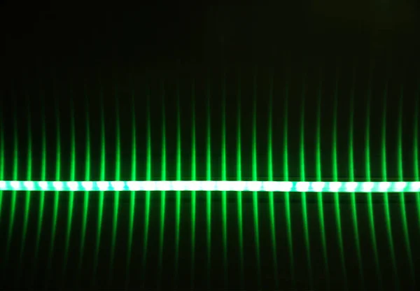 Green led lamps in a row abstract background