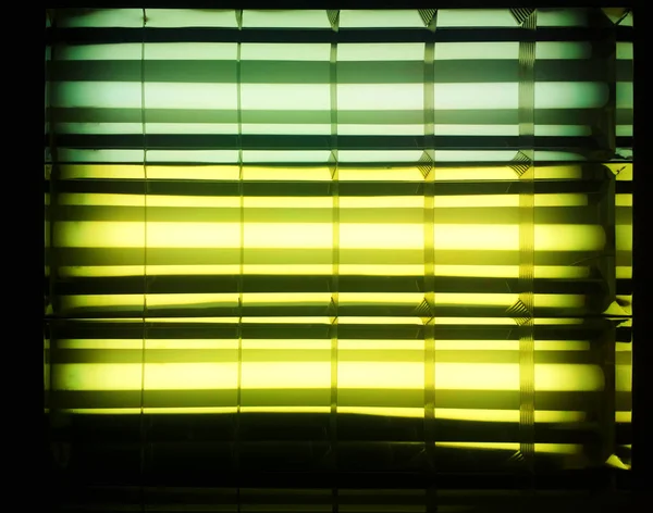 Horizontal green and yellow neon lamps background — Stock Photo, Image