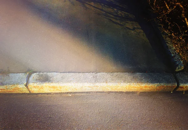 Light ray illuminating street pavement background — Stock Photo, Image