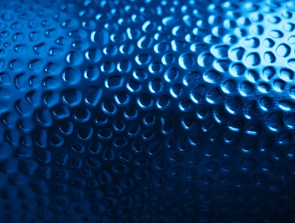 Blue extruded shaped metal texture background