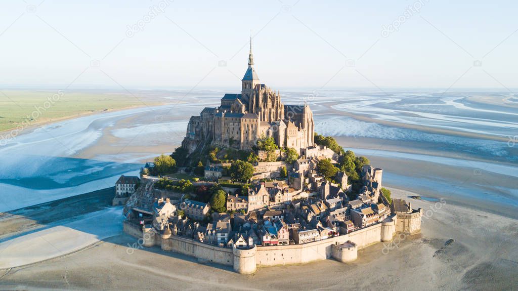 Le Mont Saint-Michel tidal island in beautiful twilight at dusk,