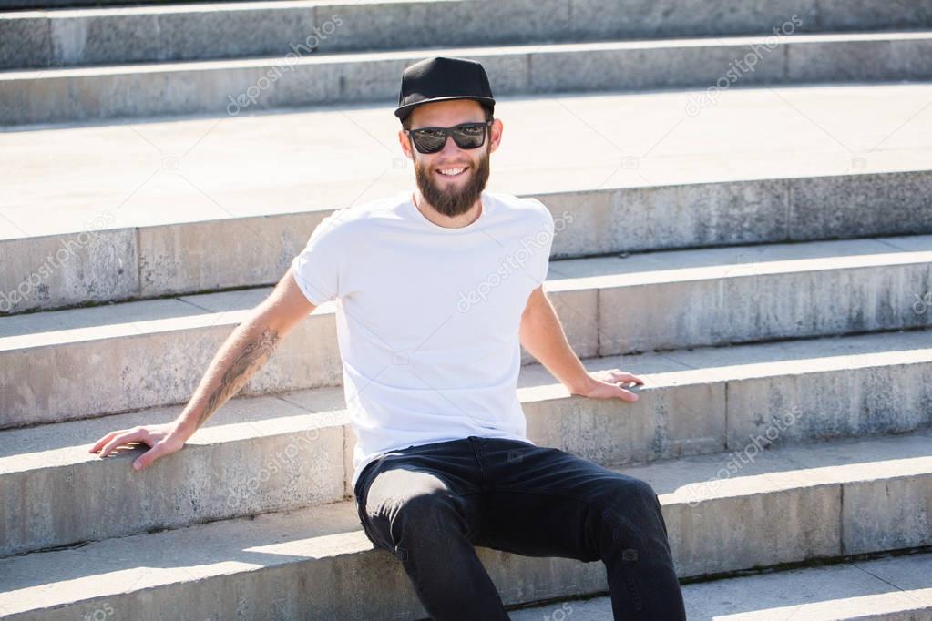Hipster handsome male model with beard  wearing white blank  t-s